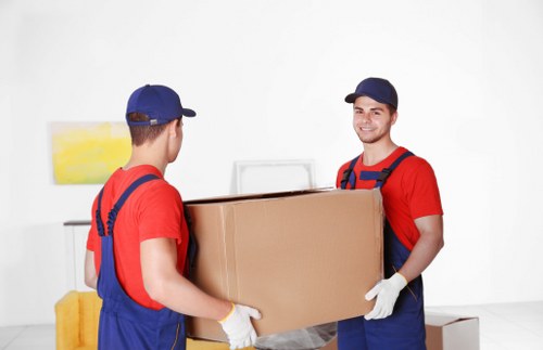 Unpacking service helping a family settle into a Parsons Green home