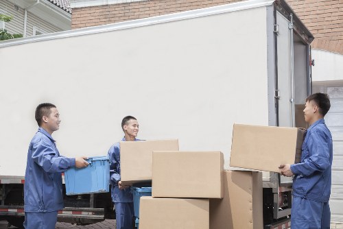 Prepared moving boxes and household items ready for collection
