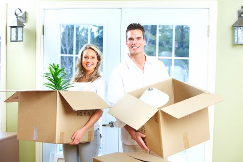 Local team packing fragile items for a move in Parsons Green
